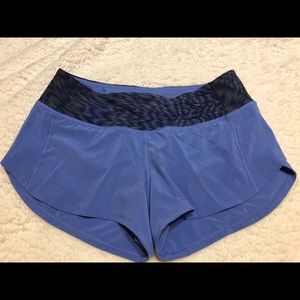 Lululemon running shorts.  SZ 4